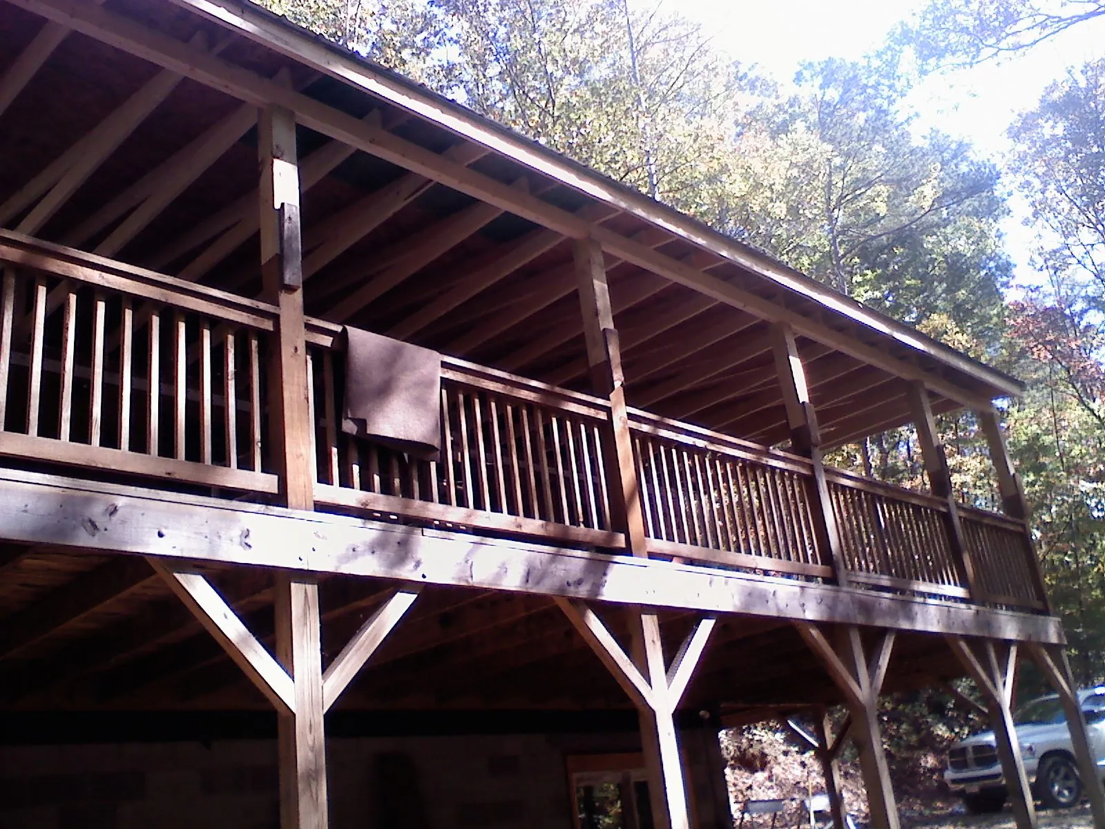 Timber framing under a new elevated porch and deck — Roof Leak Repair in San Martin by Roofing Brothers